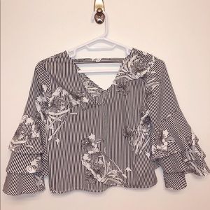 White and black floral patterned flowy blouse